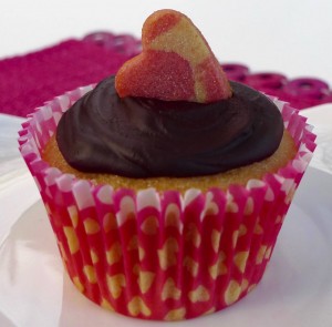 Hidden heart cupcake with chocolate frosting